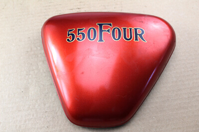 Side cover left Honda CB550F used original paint