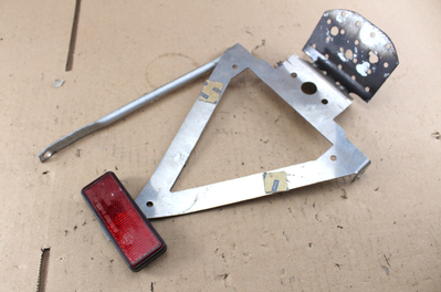 Rear light carrier with cat's eye for conversion