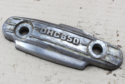 Tappet adjusting cover left Honda CB650F+C used